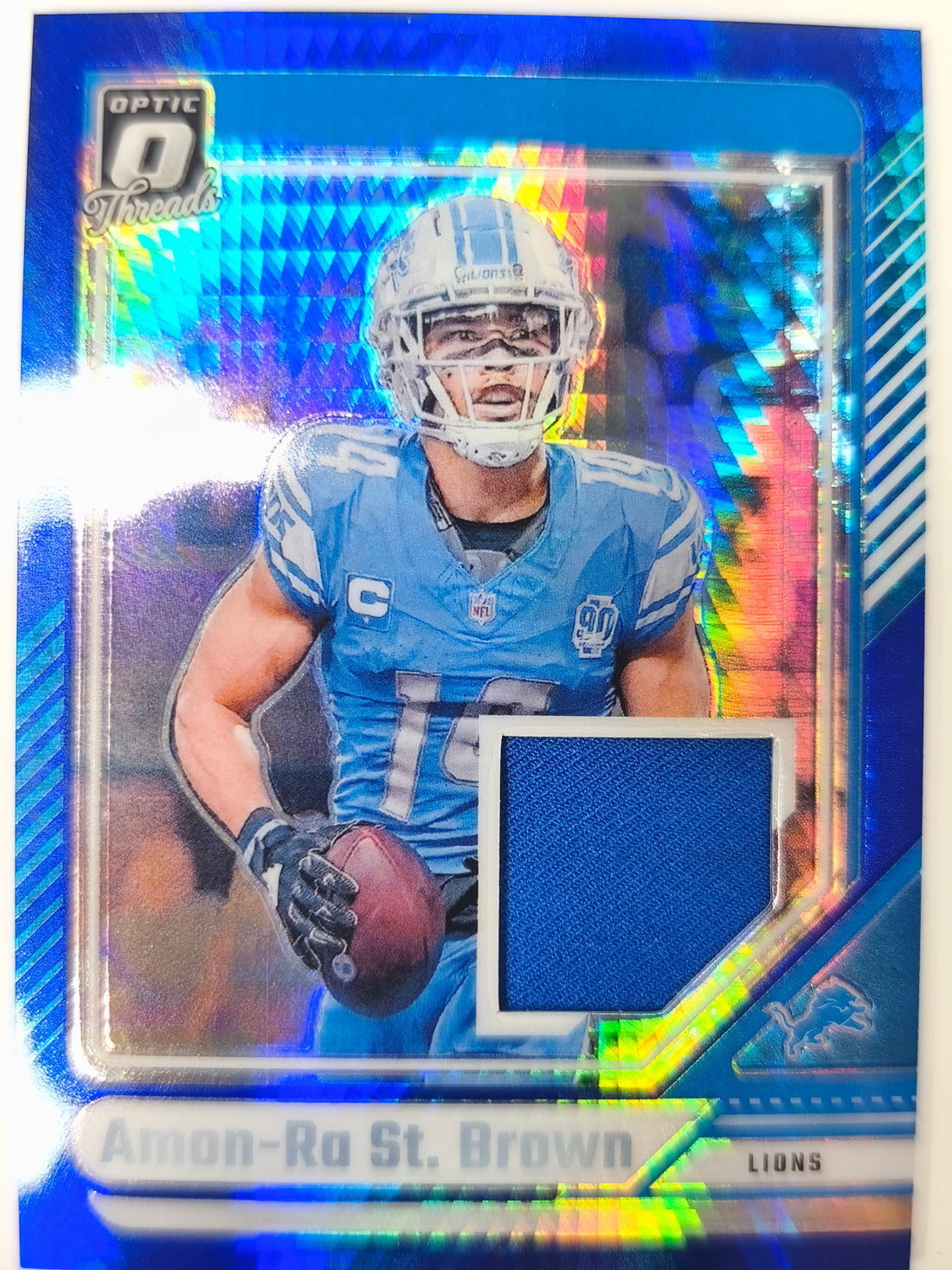 2024 Donruss Optic Threads Blue Hyper Amon-Ra St. Brown #DTB-ASB