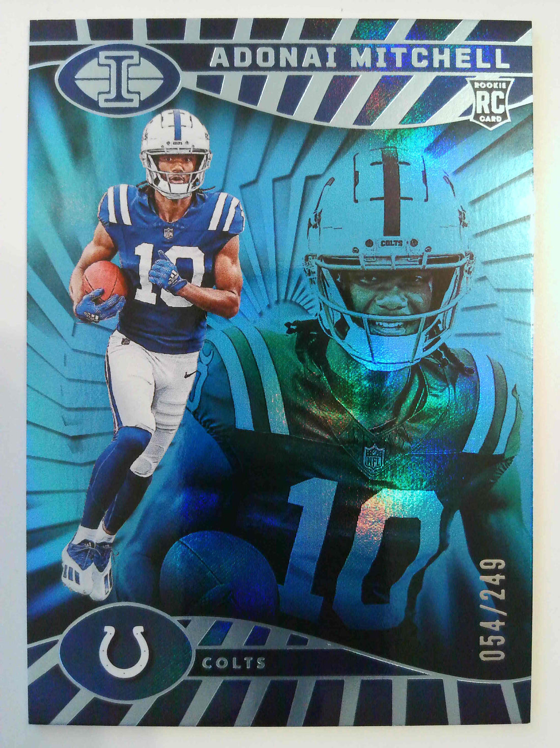 2024 Panini Illusions Light Blue Trophy 054/249 Adonai Mitchell #36 RC