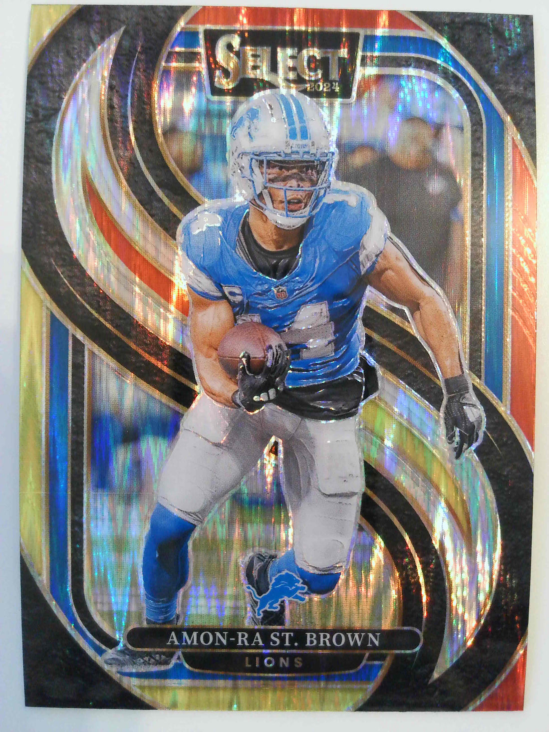 2024 Panini Select Football Black & Orange Prizm Shock Amon-Ra St. Brown #105