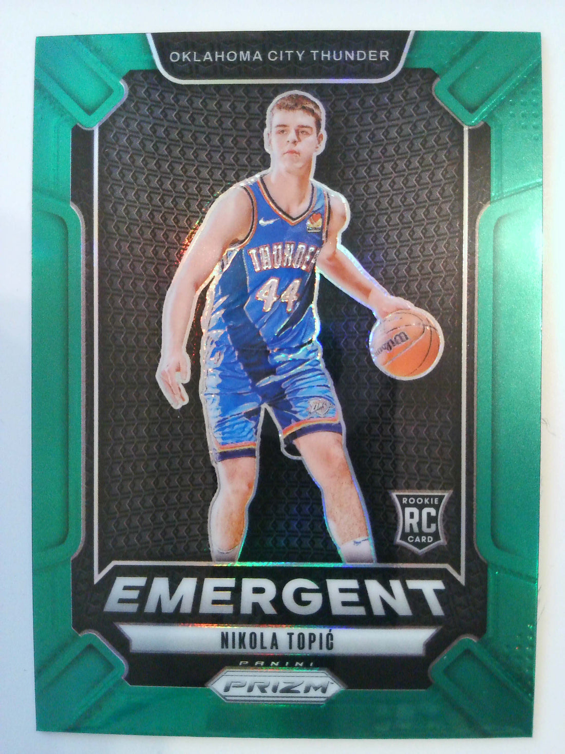2024-25 Panini Prizm Basketball Emergent Prizms Green Nikola Topic #18