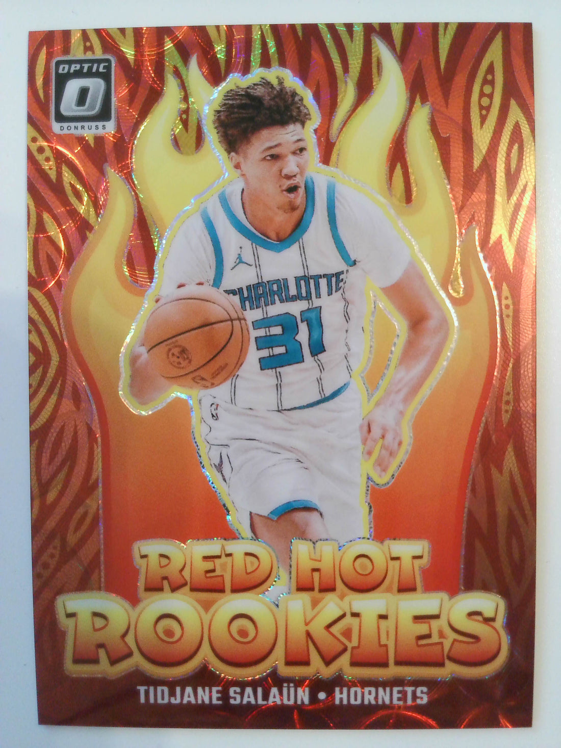 2024-25 Donruss Optic Basketball Red Hot Rookies Red 26/99 Tidjane Salaun #5