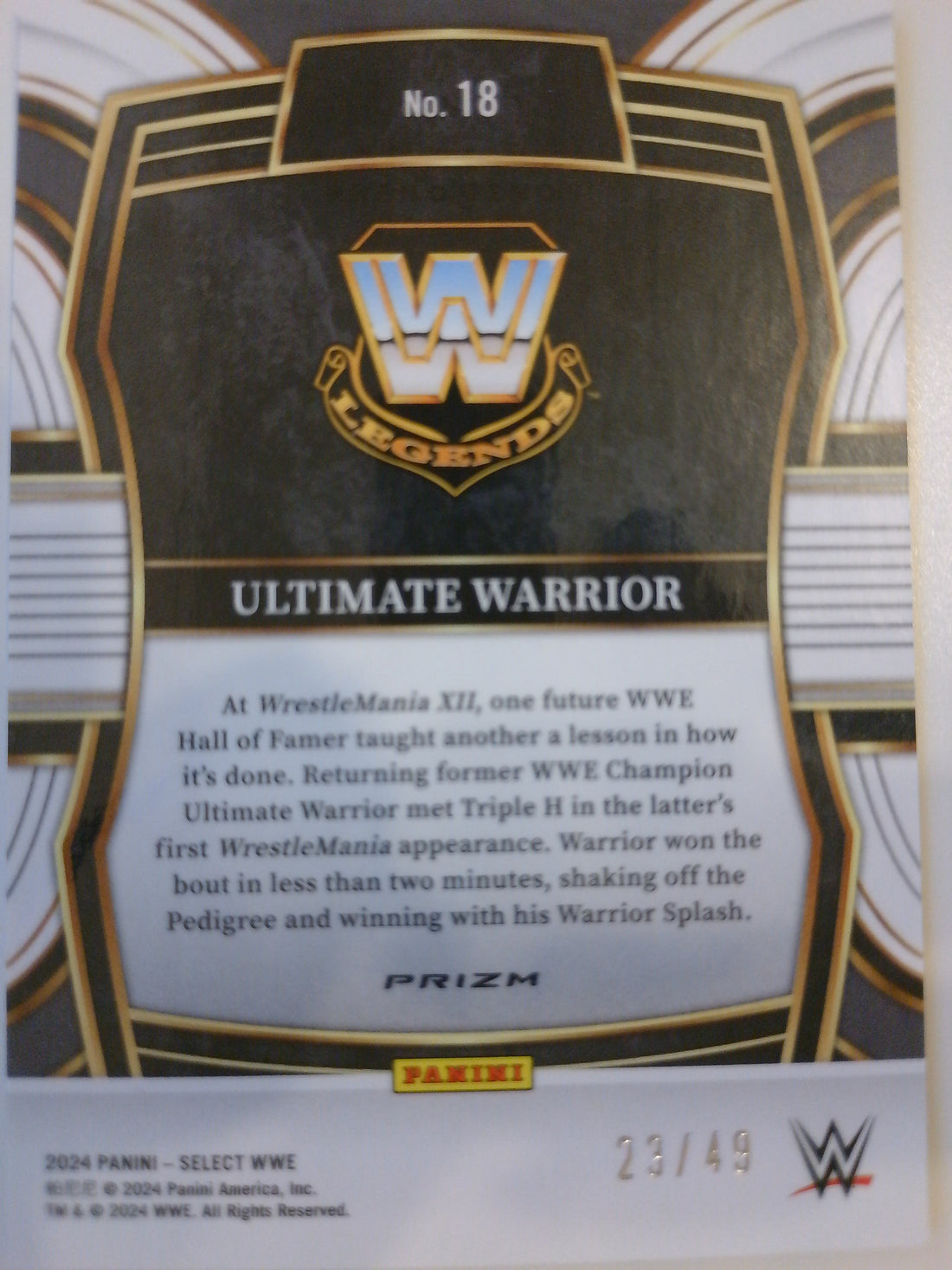 2024 Panini Select WWE Blue Wave Prizms 23/49 Ultimate Warrior #18