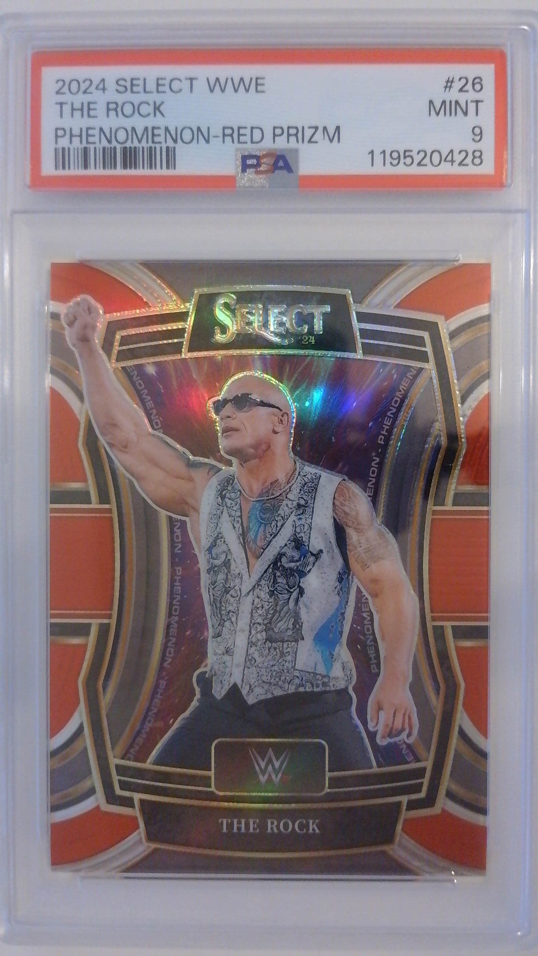 2024 Select WWE Phenomenon-Red Prizm 33/99 The Rock #26 PSA 9