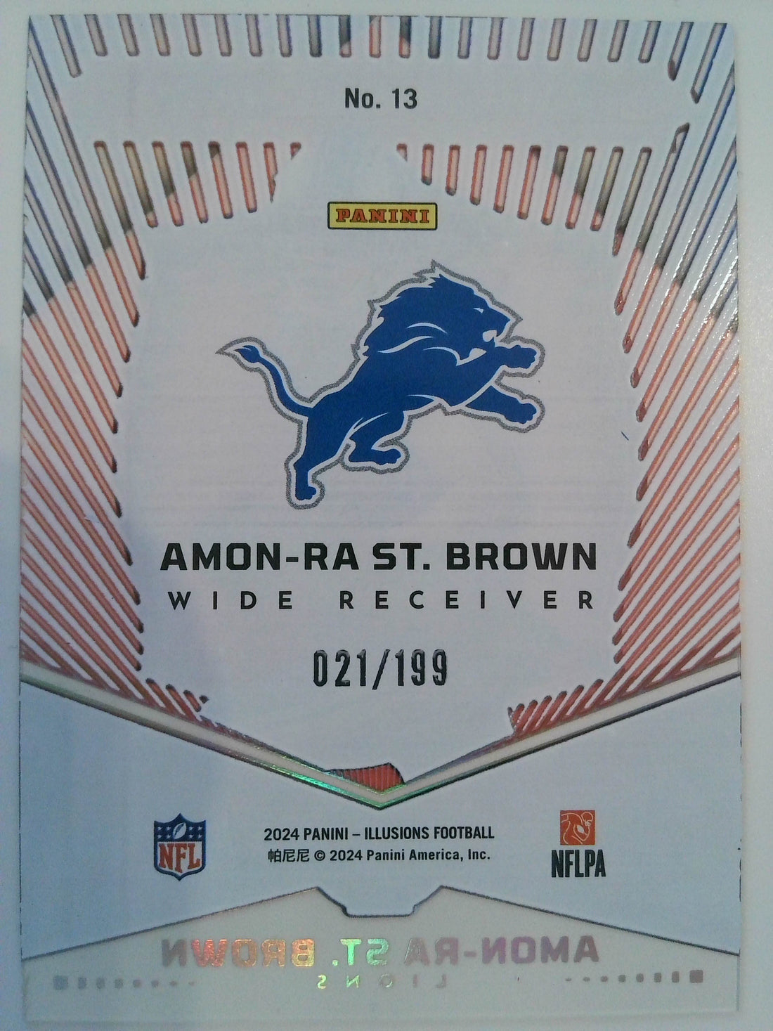 2024 Panini Illusion Abracadabra 021/199 Amon-Ra St. Brown #13